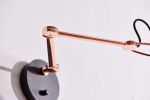 Laito Mini Wall Sconce L | Sconces by SEED Design USA. Item made of steel