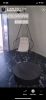 Soft Leather Swing in Santorini, Greece | Easy Chair in Chairs by Studio Stirling | Abyss Santorini in Oia. Item made of steel with leather works with boho & art deco style