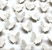 Set of 25 Botanical Butterflies wall sculpture artwork | Wall Hangings by Elizabeth Prince Ceramics. Item composed of ceramic in minimalism or mid century modern style