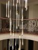 Ferraro Long Staircase Chandelier in hand-blown glass | Chandeliers by Galilee Lighting. Item made of glass