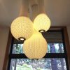 Hanging Knitted Lampshades - 3 units chandelier | Plant Hanger in Plants & Landscape by Ariel Zuckerman Studio. Item composed of fabric and glass in modern style