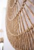 WHEEL Round Raffia Macrame Wall Hanging | Wall Hangings by Vila Vera. Item composed of fiber