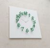 Mocap "white/green" Illusionistic Wall Clock | Decorative Objects by JAN PAUL. Item composed of wood and metal in mid century modern or contemporary style