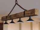Reclaimed beam chandelier | Chandeliers by FrostCanyon Designs/Bo Sanders/the shop. Item made of wood with metal works with country & farmhouse & rustic style