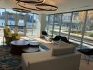 Custom Lobby Furniture (Sofas, Chairs, Tables) | Armchair in Chairs by Greg Sheres | Clippership Apartments on the Wharf in Boston. Item composed of fabric