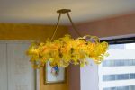 Gold Cirrus | Chandeliers by April Wagner, epiphany studios. Item made of glass