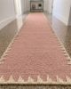 Handwoven Woolen Pink Runner Rug | Rugs by Evergreen Carpets. Item made of wool works with boho & minimalism style