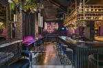 Decorative wall in a bar “Le Kiki” | Lighting by Pleiades lighting