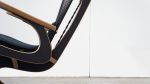 Hippokamp Lounge Chair & Footstool - Fabric | Chairs by Peter Qvist. Item made of birch wood with fabric works with minimalism & contemporary style