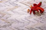 Skinny Chevron Calacatta Gold Mosaic Tile | Tiles by Tile Club. Item composed of marble