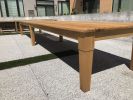 19' Black Locust outdoor dining table | Tables by Heirloom Custom Woodworks LLC | Millennium at West End in St. Louis Park