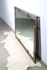 Bronze and Macassar Ebony Wall Mirror by Costantini, Marco | Decorative Objects by Costantini Design. Item composed of glass