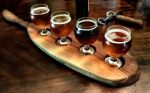 Beer Flight, Carved Handle 4 Glass Holder | Tableware by Wild Cherry Spoon Co.. Item composed of wood in minimalism or country & farmhouse style
