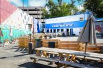 Tyson Luxury Lilies Mural | Street Murals by Michael Pacheco | Tysons Biergarten in Tysons. Item composed of synthetic
