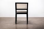 Armchair with Caned Back in Ebonized Wood by Costantini | Chairs by Costantini Design. Item made of wood