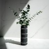 Textured Black Concrete Cylinder Vase with Grey Picture Jasp | Vases & Vessels by Carolyn Powers Designs. Item made of concrete with glass works with minimalism & contemporary style