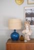 Handmade Ceramic Table Lamp:Deep Ocean Blue raffia shade | Lamps by ENOceramics. Item made of fabric with ceramic works with boho & japandi style