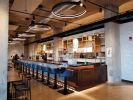Custom Chairs and Barstools for Guinness | Bar Stool in Chairs by Greg Sheres | Guinness Open Gate Brewery in Halethorpe. Item made of wood & fabric