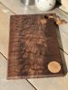 Black Walnut Burl Board with circle inlays | Serveware by Patton Drive Woodworking. Item composed of walnut