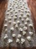 El Numero del Infinito (Infinity's Number) | Wall Sculpture in Wall Hangings by Lucia Warck-Meister. Item composed of ceramic and synthetic