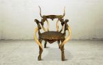 VIZIGO | Accent Chair in Chairs by Michel Haillard. Item made of wood with bronze