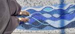 Mosaic patio inlay suggesting a river | Public Mosaics by JK Mosaic, LLC. Item made of stone