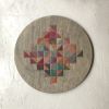 Daira | Embroidery in Wall Hangings by Nosheen iqbal. Item made of birch wood & cotton