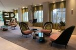 Modern Wheel in the Celebrity Edge Cruise | Swing Chair in Chairs by Studio Stirling. Item made of steel works with minimalism & coastal style