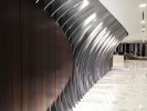 Gunster Feature Wall | Paneling in Wall Treatments by Amuneal | Gunster in Miami. Item made of aluminum
