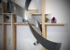 echoes in the distance | Sculptures by Craig Robb | Otten Johnson Robinson Neff + Ragonetti PC in Denver. Item made of wood with steel