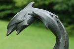 Dolphin Family | Public Sculptures by Jim Sardonis | Fairhope in Fairhope. Item made of bronze with stone
