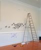 Murmurations 3, installation of clay birds | Wall Sculpture in Wall Hangings by Susan Hostetler Studio | Athenaeum in Alexandria. Item composed of ceramic