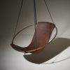 Studio Stirling Favorite Brown Sling Chair | Swing Chair in Chairs by Studio Stirling. Item made of steel with leather