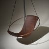 Studio Stirling Favorite Brown Sling Chair | Swing Chair in Chairs by Studio Stirling. Item made of steel with leather
