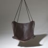 Studio Stirling ButterFLY Leather Sling Chair | Swing Chair in Chairs by Studio Stirling. Item made of steel with leather works with boho & minimalism style