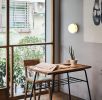 Pensee Wall Sconce | Sconces by SEED Design USA. Item composed of brass and glass