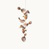 Dune 8 Vertical Cluster in Metallic Tones Pendant Light | Chandeliers by MOSS Objects. Item composed of metal compatible with contemporary and japandi style