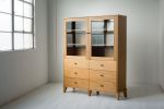 Pacific Curio Cabinet in American Cherry | Storage by Studio Moe. Item composed of wood