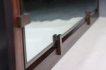 Bronze and Macassar Ebony Wall Mirror by Costantini, Marco | Decorative Objects by Costantini Design. Item composed of glass