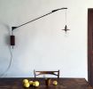 JP swivelling wall lamp | Lighting by 2MONOS STUDIO. Item made of oak wood works with mid century modern style