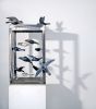 Caged Birds, steel structure with clay bird scuptures | Sculptures by Susan Hostetler Studio