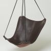 Studio Stirling ButterFLY Leather Sling Chair | Swing Chair in Chairs by Studio Stirling. Item made of steel with leather works with boho & minimalism style