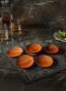 Cherry Wood Plate Set | Hand-Turned Luxury Dining Essentials | Decorative Bowl in Decorative Objects by Holzkunst Samuel Meisinger. Item composed of wood in minimalism or art deco style