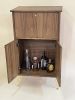 Modern Bar Cabinet | Storage by Fox Farm Design Build. Item made of walnut compatible with boho and mid century modern style