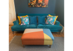 Marlow Large footstool upholstered in colour block geometric | Chairs by Sadie Dorchester. Item composed of cotton