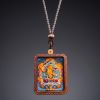 Artisan Manjushri Thangka Ash Clay Buddhist Amulet Pendant | Ornament in Decorative Objects by Dynasty Artisan. Item made of leather compatible with contemporary and eclectic & maximalism style