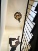 Chandelier in a private home staircase | Chandeliers by Pleiades lighting