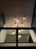 Golden Bell Flower Chandelier | Chandeliers by PATAPiAN. Item composed of bamboo & brass
