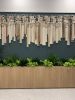 Woven Ceramic Wall Sculpture with Cotton and Tencel Fringe | Wall Hangings by Karen Gayle Tinney | The Odeon in New Orleans. Item composed of cotton and ceramic in contemporary or modern style
