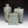 Set of porcelain vessels with geometric inlaid designs | Vase in Vases & Vessels by Pierre Bounaud Ceramics. Item composed of ceramic
